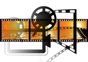 Proyector de cine con luces de colores, representando el análisis del cine cubano y estudios de género.